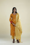 Marigold Orange Straight Suit Set With Floral Weaving